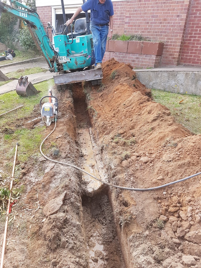 Mini-excavator trenching and drainage work by Luke Taylor Plumbing